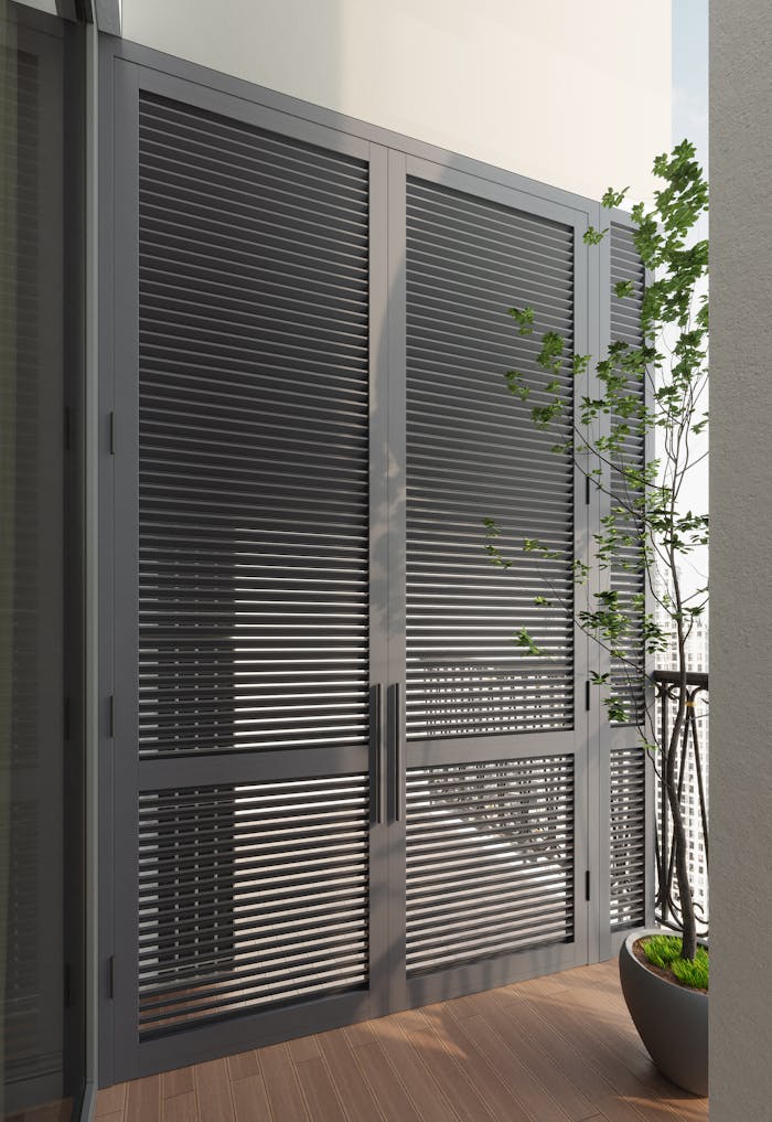 Elegant modern balcony with sleek glass doors and minimalist design elements.